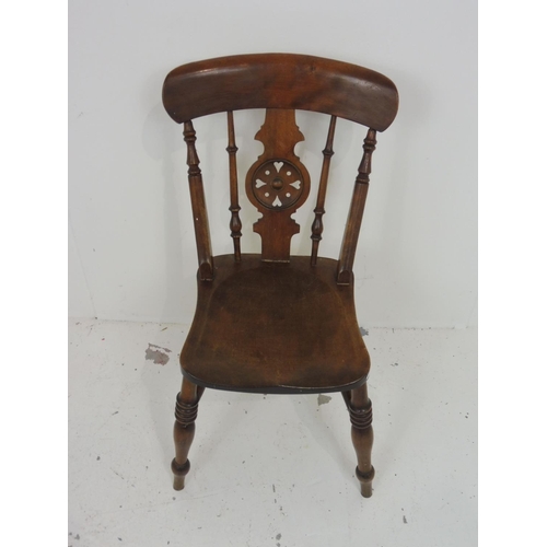 538 - Victorian style, wheel back, dining chair with elm seat and turned legs.