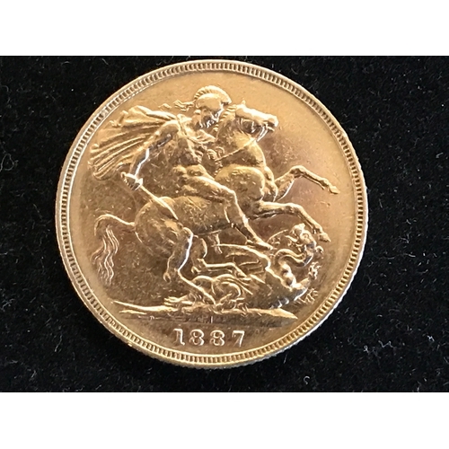 409 - Queen Victoria Gold Sovereign from Victoria's Jubilee year of 1887, featuring the traditional George... 