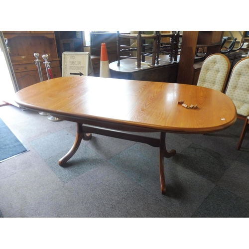 90 - A Teak Extending Dining Table and 6 chairs incl 2 Carvers