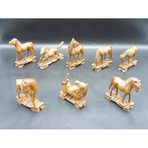 58 - Set of 8 Chinese Wooden Carved Horses in Various Positions (noble steed) on Plinths with Glass Eyes ... 