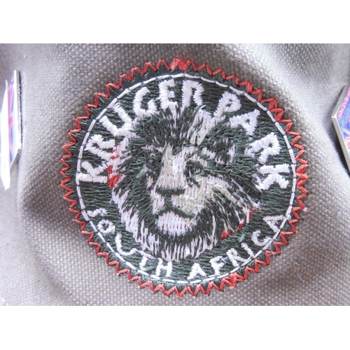 131 - Kruger Park South Africa Hat complete with approx. 30 Armed Forces Show your support pin badges