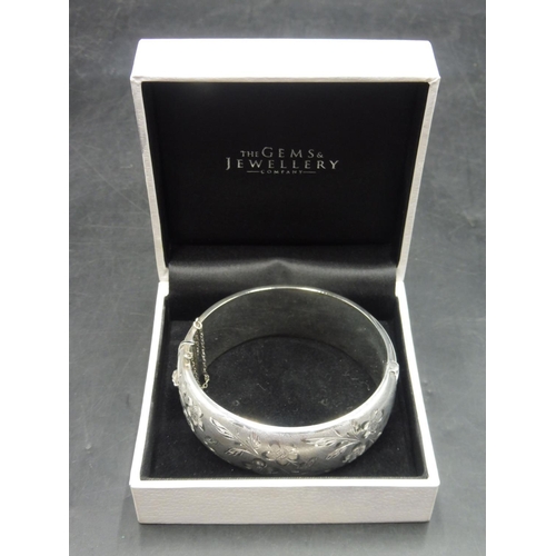 396 - Hallmarked Birmingham Silver Etched Bangle with Safety Chain Complete with Presentation Box