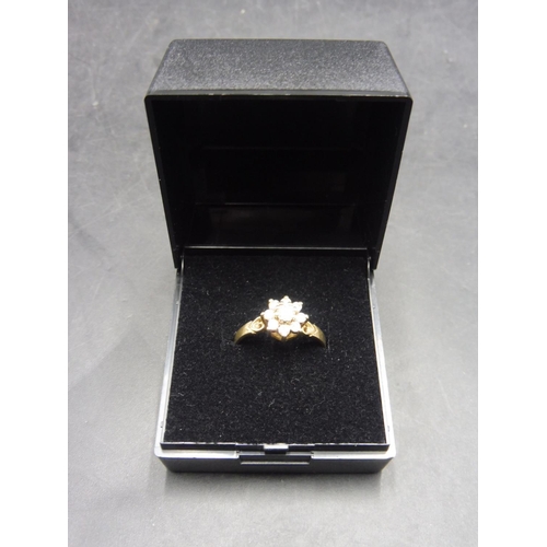 493 - Hallmarked Sheffield 375 Gold and Diamond Cluster Flower Ring (Size M) Complete with Presentation Ca... 