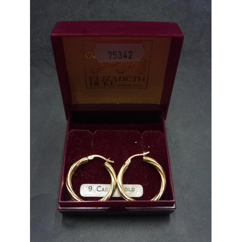 515 - Pair of Gold 375 Earrings complete with case