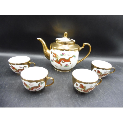 265 - Chinese Tea set includes Four Cups and Teapot