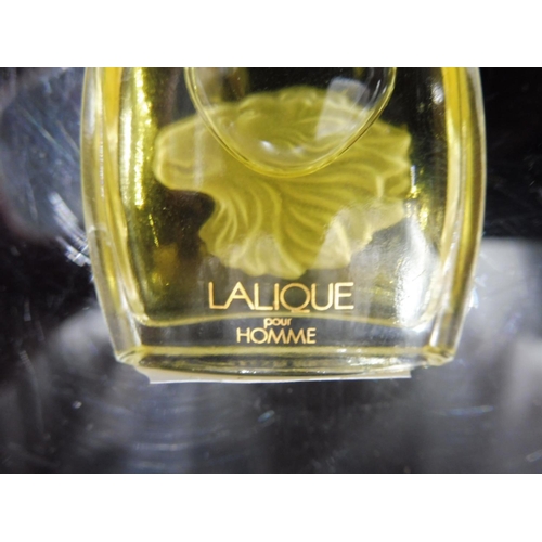 394 - Lalique Perfume Bottle with Contents