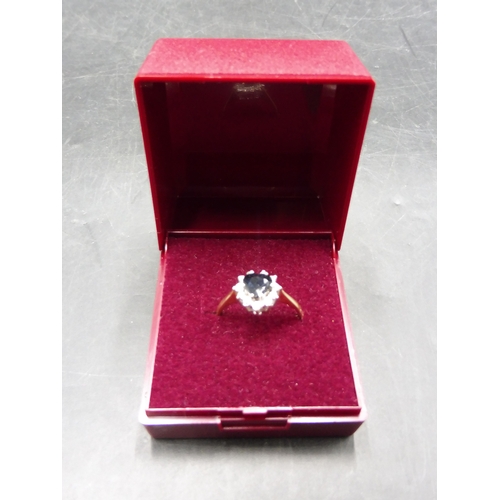 489 - Hallmarked London 375 Gold Diamond and Blue Stoned Ring (Size O) Complete with Presentation Box