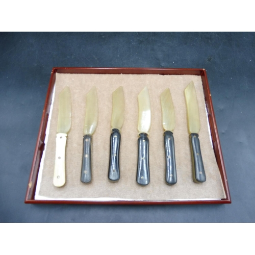 596 - Tray of Six Antique Caviar Knifes 5 Black Handles and 1 White Handle