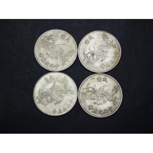 523 - Four Replica Dragon Coins