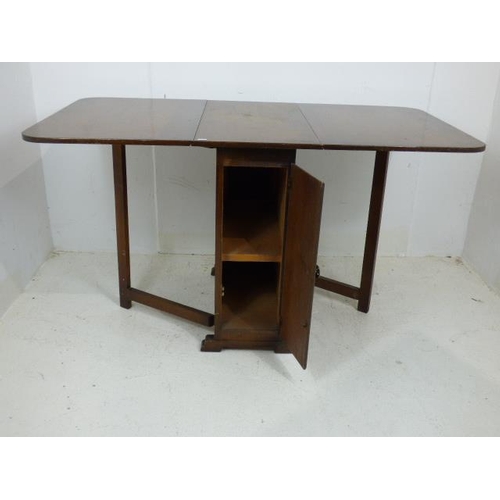 719 - Vintage Drop Leaf Table with Built in Shelf and Door at each end of Table 29.5