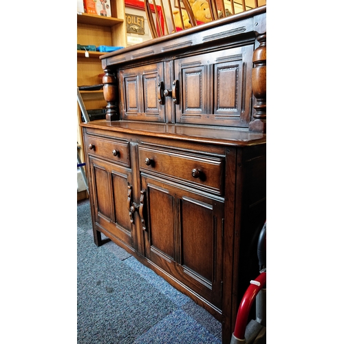 645 - An Ercol Sideboard / Buffet