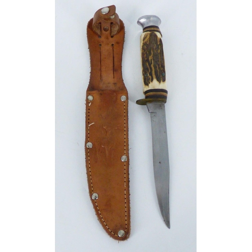 677 - A German Bone Handled Hunting Knife in leather Sheath