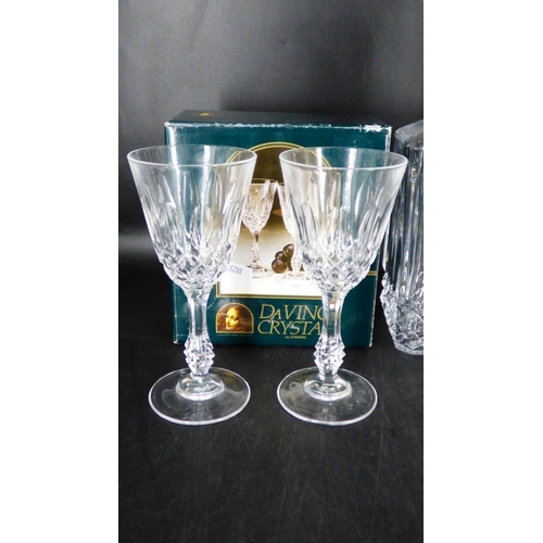 710 - A Crystal D Arques Decanter, A Boxed Set of 4 Crystal D Arques Longchamp Glasses and a Boxed Pair of... 