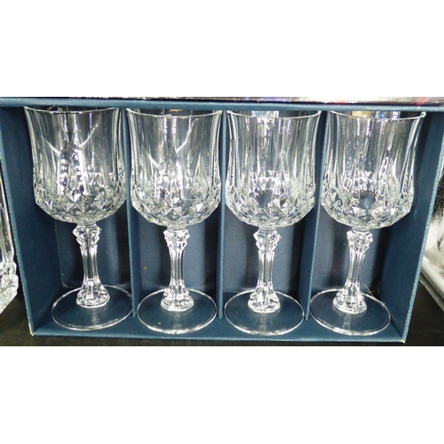 710 - A Crystal D Arques Decanter, A Boxed Set of 4 Crystal D Arques Longchamp Glasses and a Boxed Pair of... 