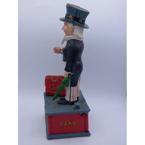 24 - Cast Iron Uncle Sam Moving Money Box (11