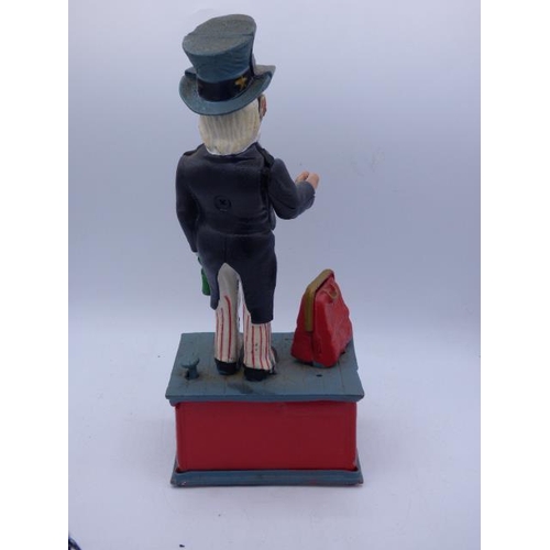 24 - Cast Iron Uncle Sam Moving Money Box (11