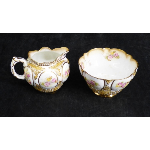 61 - Crescent China milk & sugar Bowl in stand (a/f)