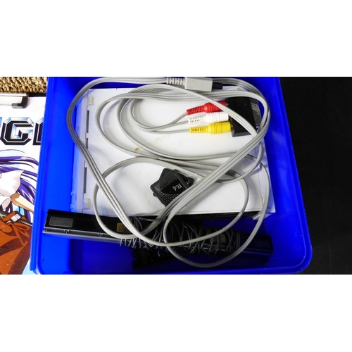 242 - Wii console (untested) with Sensor, R4 Cards, Sega Power Supply and a Magna Draw book