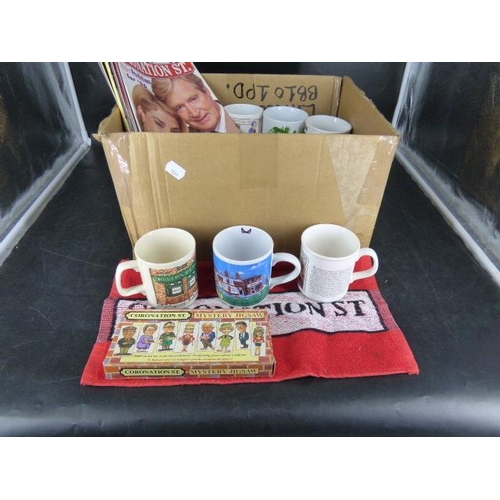 676 - Box of Coronation Street Collectables Includes 7 Mugs Featuring Stan and Hilda, Reg Holdsworth and M... 