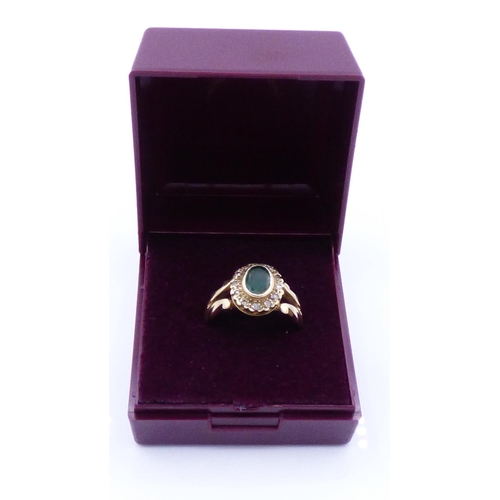 60 - Hallmarked London 375 Gold Diamond and Green Stoned Ring (Size P) Complete with Presentation Box