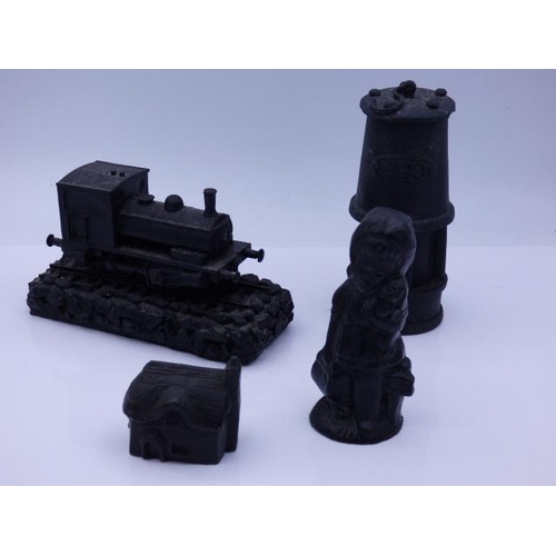 148 - Four Pieces of Coal to include Train, Miners Lamp, Cottage & Girl