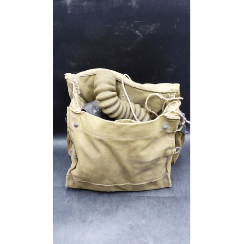 155 - WWII British Army issue gas mask with original Khaki canvas case, both date 1943