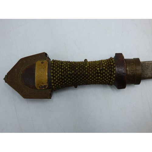 41 - 19th century North African Koummya dagger with a brass scabbard. 39cm long