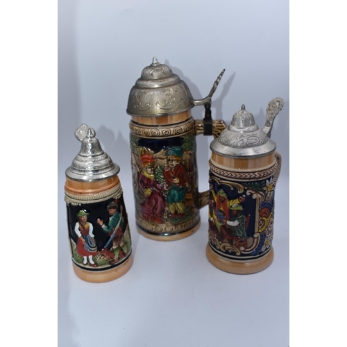 66 - Three West German Tankards with Pewter lids