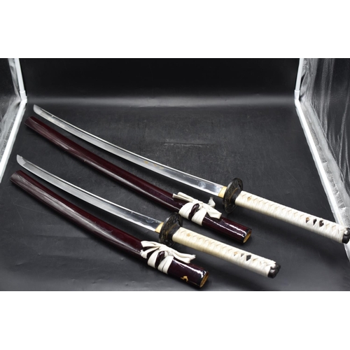 69 - Two Decorative Japanese Reproduction Samurai Sword's