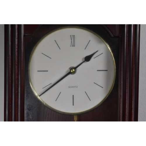 150a - Wood Cased Quartz Wall Clock with Pendulum