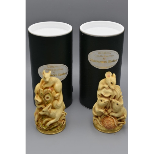 161 - Two moulded resin candle snuffers in the style of carved ivory, Delighters, by Watersmeet Studios in... 