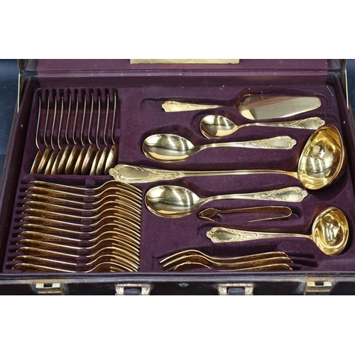 187 - A Cased 73 Piece Bestecke SBS Solingen 24ct gold plated cutlery set laid on two trays with original ... 