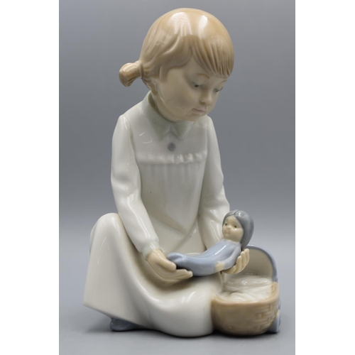 180 - Nao Figure of Girl Holding Baby