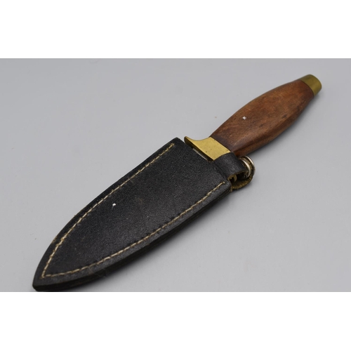 58 - Wood and Brass Handled Dagger in Leather Sheath approx 7