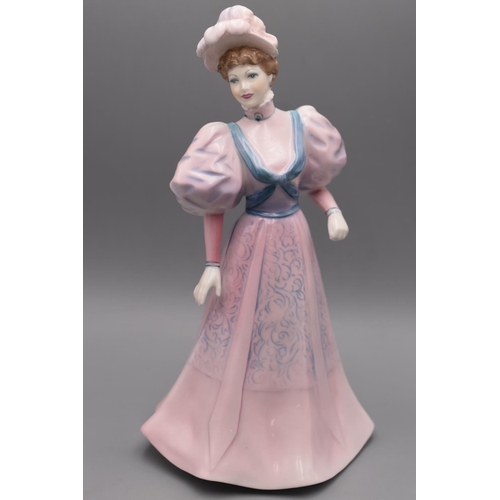 175 - Coalport Handcrafted Fine Bone China Figure - Ladies of Fashion 'Eugenie'. (21cm tall).