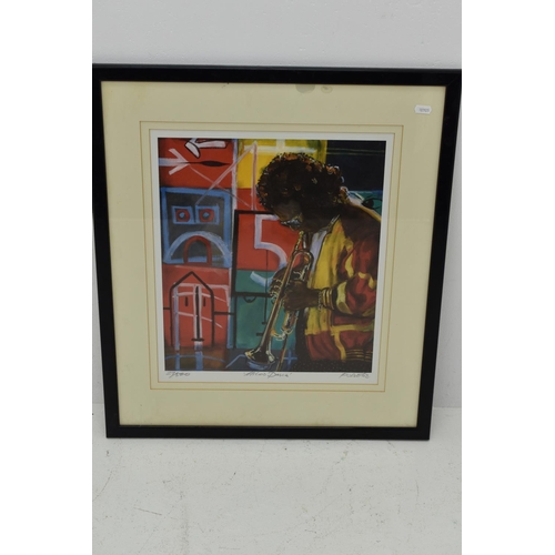 243 - Large Framed Print of Miles Davis signed by the artist Piliotis. Print 27/500. 60x52cm.