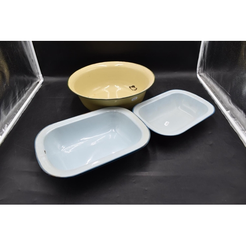 222 - A very large Vintage Enamelled Mixing Bowl and 3 Enamelled deep oven trays