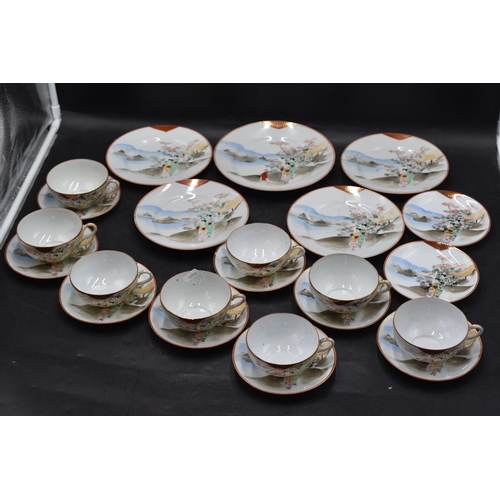 226 - Japanese Bone China Tea Set comprising;
8 x Tea cups (1 with small chip to rim), 10 x Saucers, 4 Sma... 