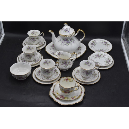 227 - Paragon - Malandi China Tea Set comprising;
Tea Pot, 4 x Tea cups and 5 x saucers, 1 x milk jug, 6 x... 