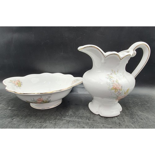 232 - A Decorative Washbowl and Pitcher