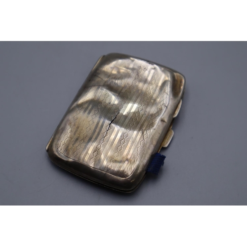 134 - Hallmarked Birmingham 1929 Silver Cigarette Case ( case has split to one side and is in a battered s... 