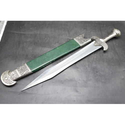 143 - Replica sword complete with sheath