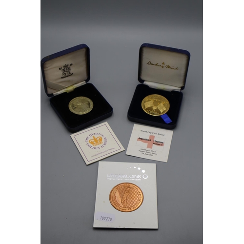 84 - A Danbury Mint 22ct Gold Plated Medal Celebrating Englands First Round Win Over Argentina in 2002, A... 