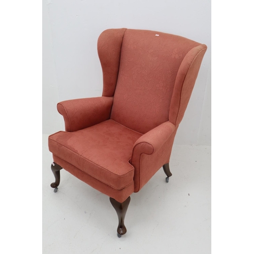 361 - A Parker Knoll Wing Back Fireside Chair On Casters