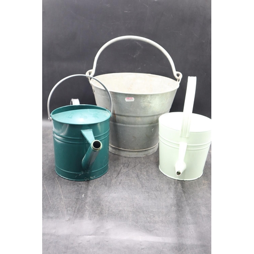 398 - A Galvanised Bucket and Two Watering Cans