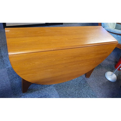5 - Mid Century Danish Style Teak Drop Leaf Dining Table .Measures 48 inches x 16 inches Folded and 48 x... 