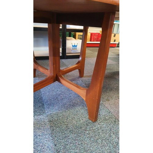 5 - Mid Century Danish Style Teak Drop Leaf Dining Table .Measures 48 inches x 16 inches Folded and 48 x... 