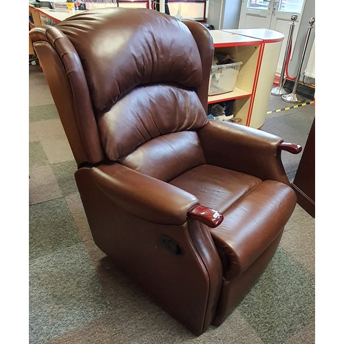 29 - A Brown Leather / Faux Leather Manual Recliner Chair