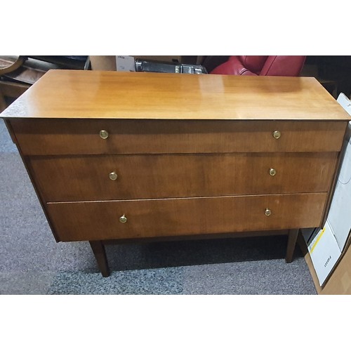 41 - A 1960's Symbol Furniture Bedroom Suite Comprising of Chest of Drawers, Two Dressing Tables and a Sh... 