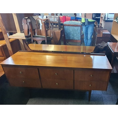 41 - A 1960's Symbol Furniture Bedroom Suite Comprising of Chest of Drawers, Two Dressing Tables and a Sh... 